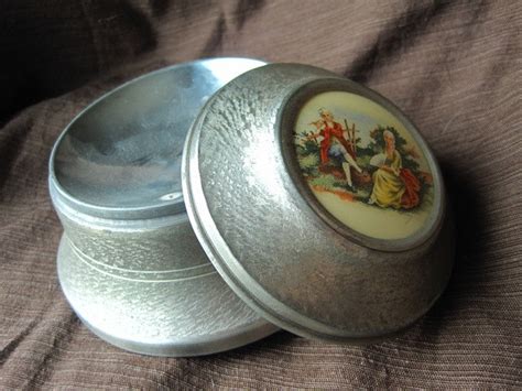 vintage metal powder music box|sold musical powder box.